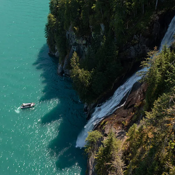 Nature puts on a show for Klahoose Wilderness Resort guests in Toba Inlet / Klahoose Territory during The Whales & Waterfalls Boat Tour.