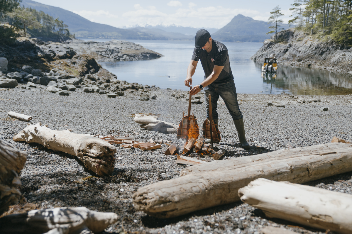 Cooking salmon on a beach in Port Hardy, Nathan Martin