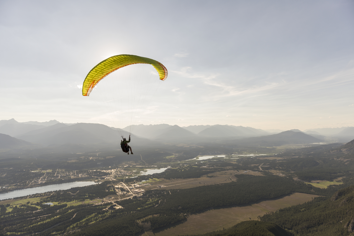Paraglider over Mt Swansea Credit Destination BC/Kari Medig