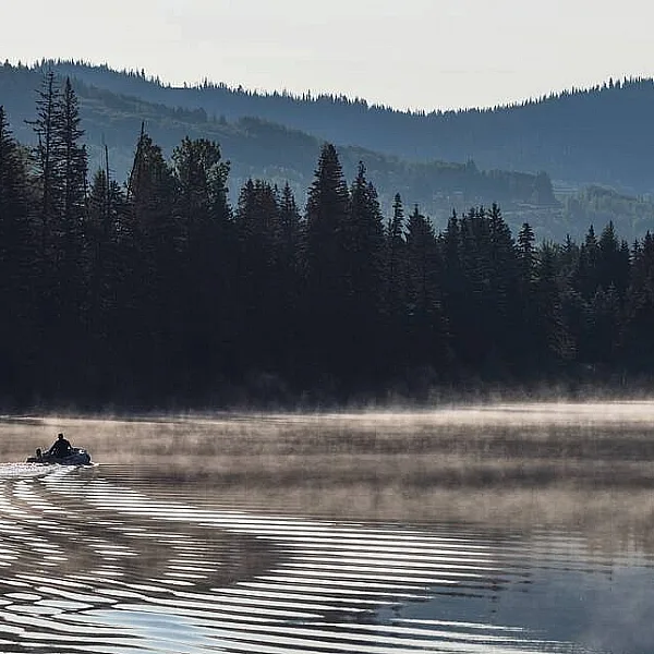 Heading out fishing on a misty morning on Lac des Roches in the Cariboo Chilcotin Coast