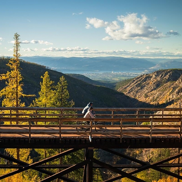 A couple biking at Myra Canyon Trestles, part of the Kettle Valley Rail Trail near Kelowna | Ken Hagen