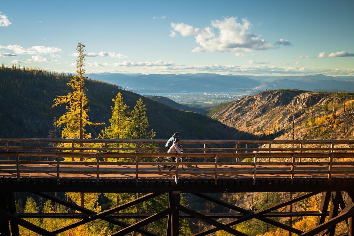 A couple biking at Myra Canyon Trestles, part of the Kettle Valley Rail Trail near Kelowna | Ken Hagen