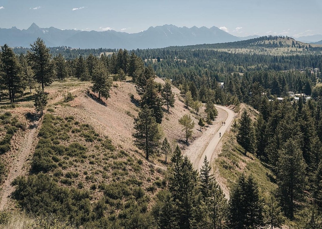 Northstar Rail to Trails with and the Rocky Mountain as the backdrop.
