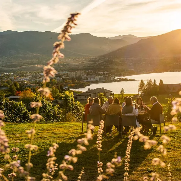 Outdoor dining in Penticton with Okanagan Lake in the background | Kari Medig