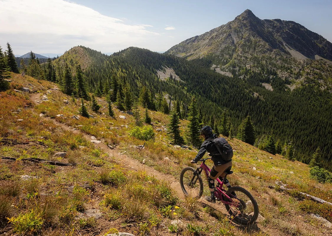 A mountain biker riding the Seven Summits Trail in Rossland.