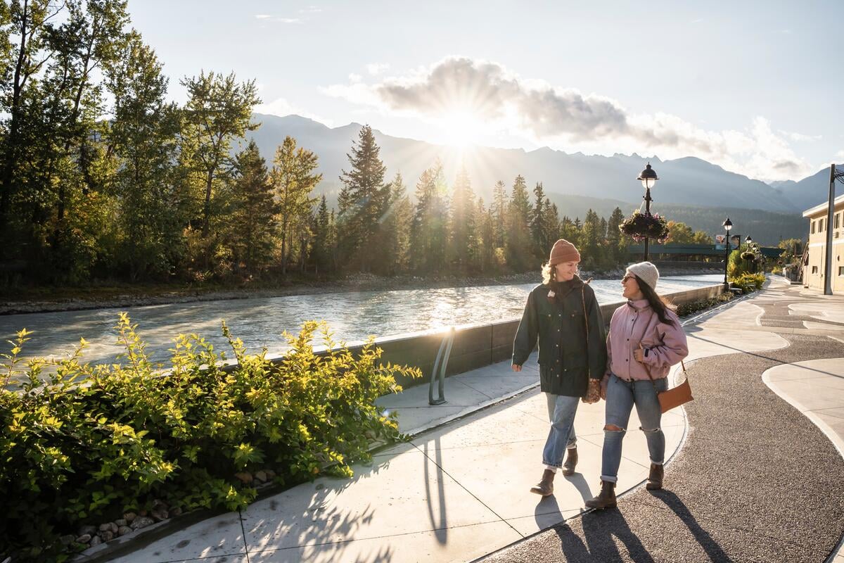 River Walk alongside the Kicking Horse River with the Kicking Horse Pedestrian Bridge in the backdrop.