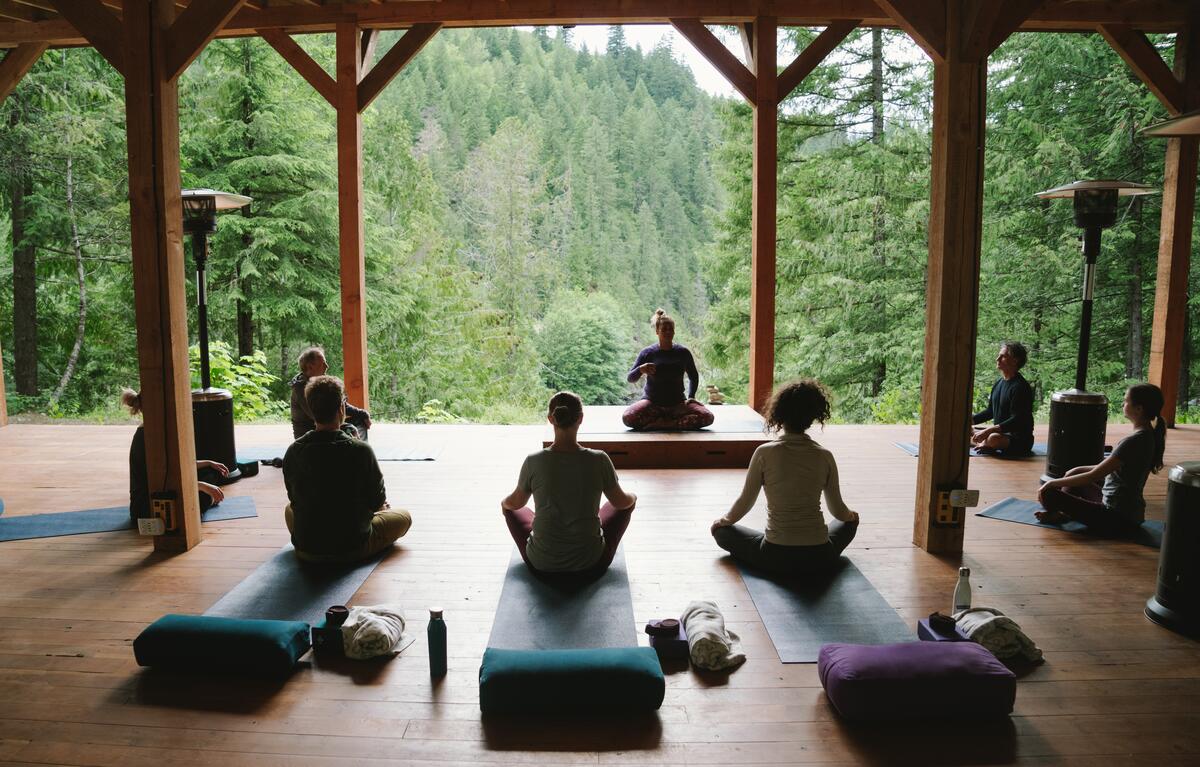 Group yoga class at REO Rafting Resort